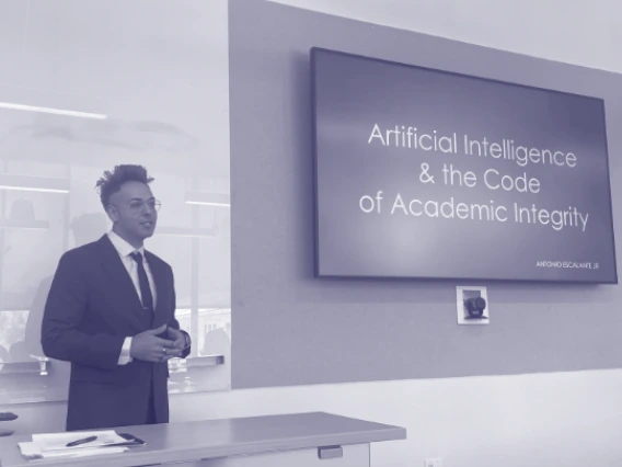 Assessment Institute participant Antonio Escalante Jr. presenting at the Capstone Showcase